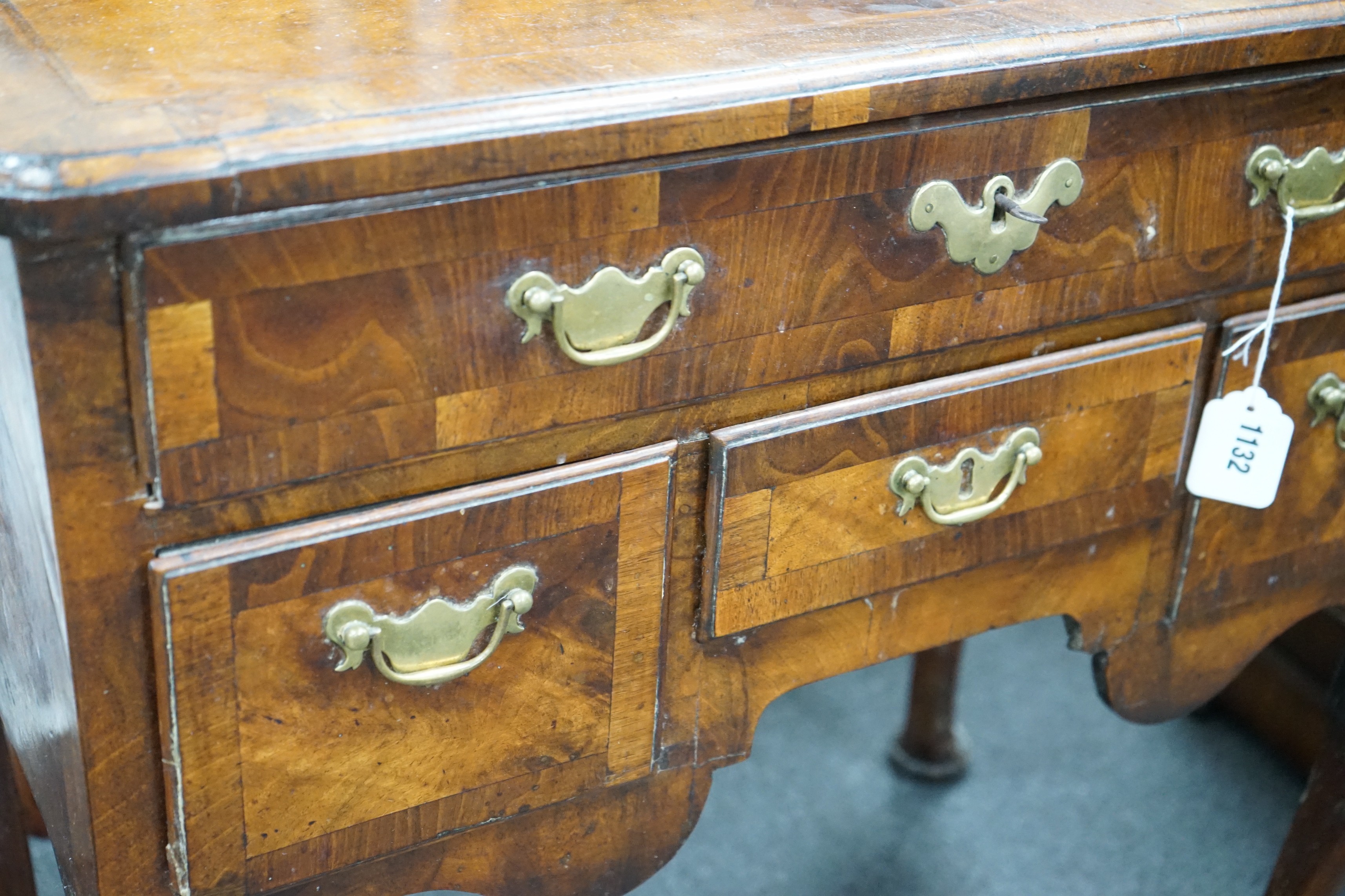 An early 18th century banded walnut lowboy width 74cm, depth 44cm, height 71cm